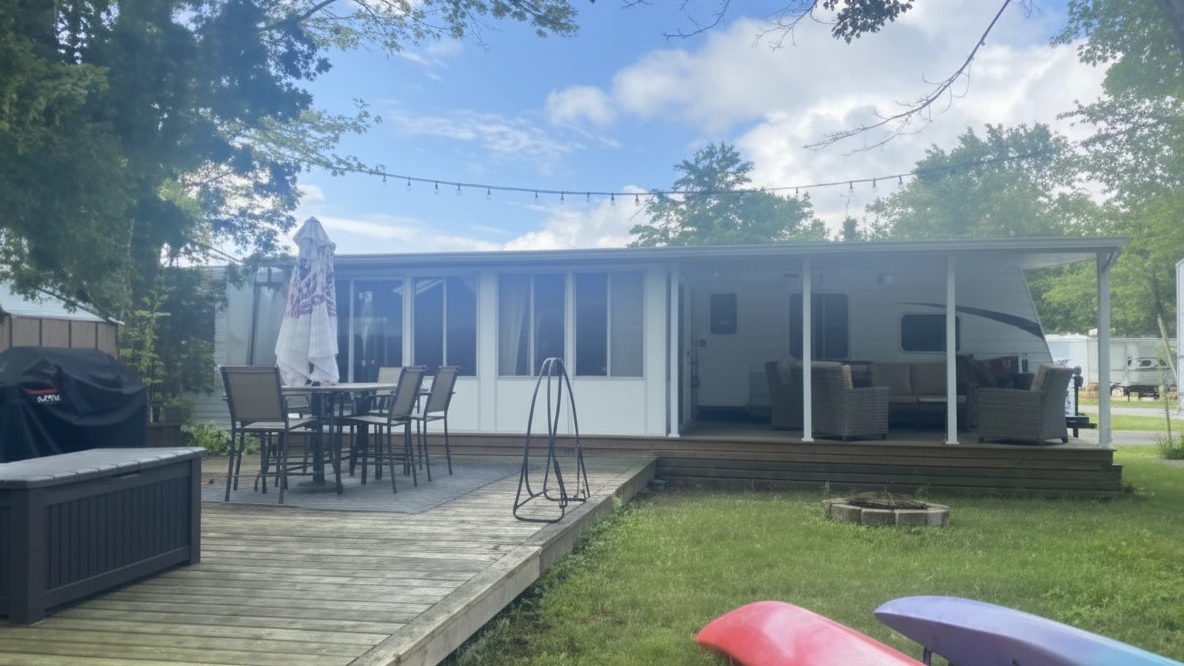 2013 Waterfront 33 ft Jayco Jay Flight with 3 Season Room Divided Into 2 Bedrooms - Red Eagle Family Campground